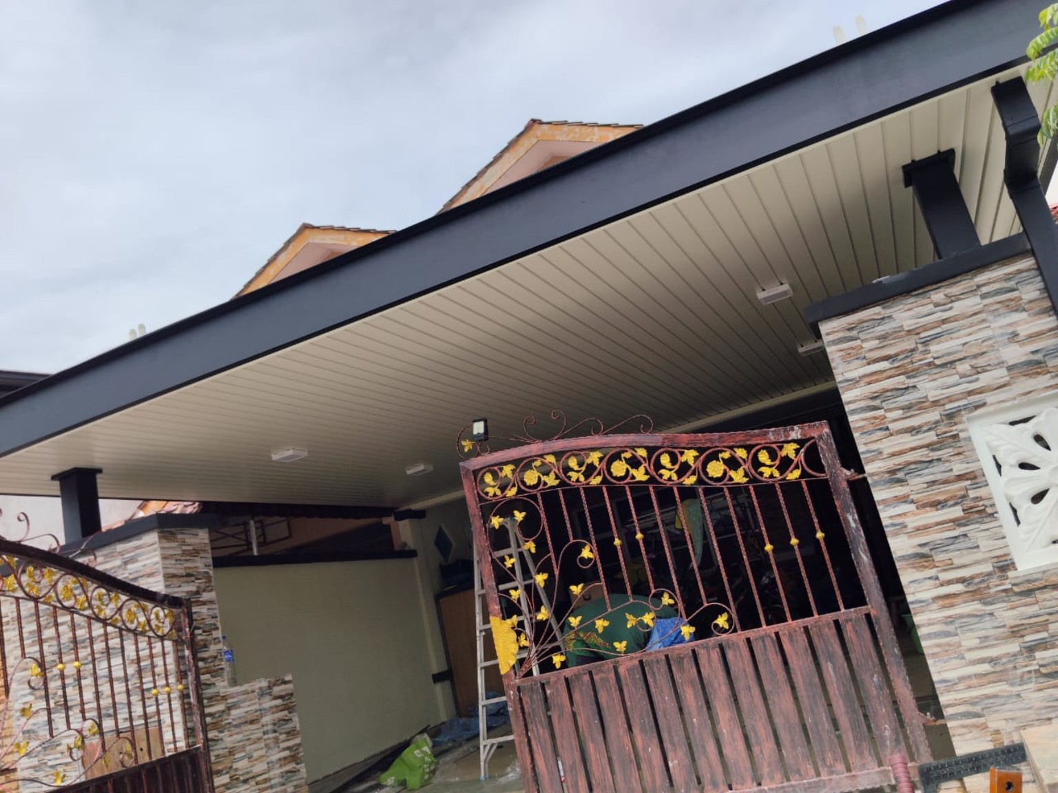 Decorative gate and covered porch